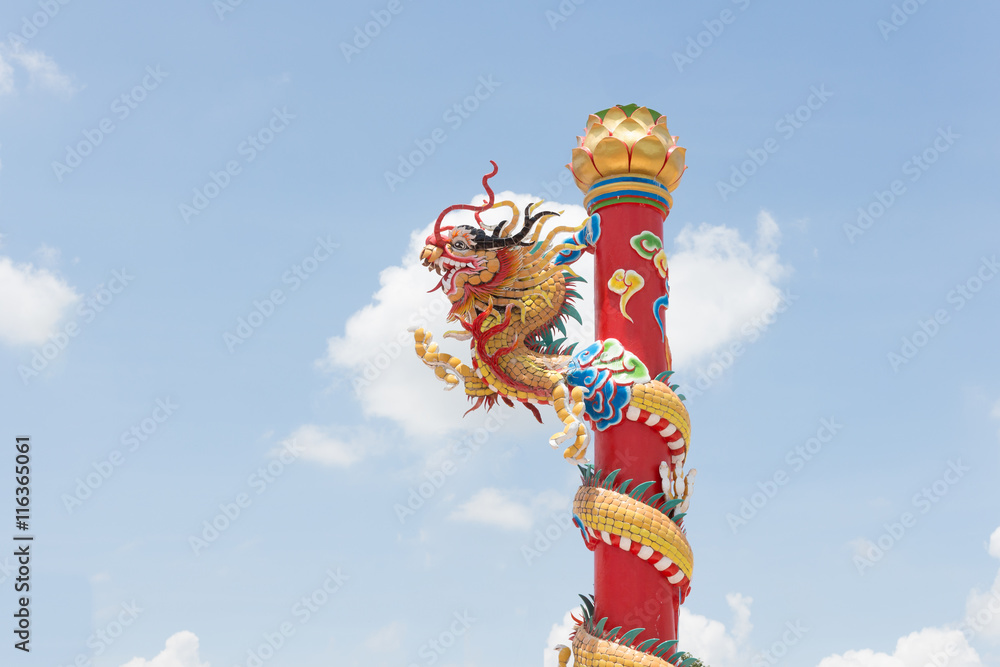 Dragon on pole over sky cloud in Chinese temple