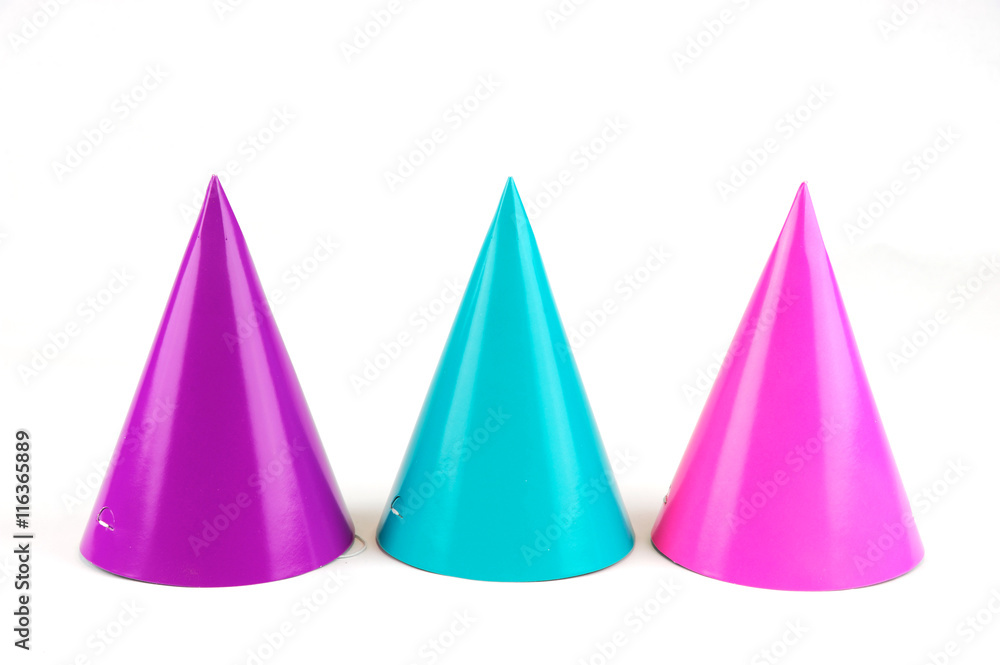 shiny party hats on white background shiny party hats on white background