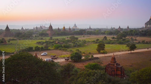 Wallpaper Mural Video 1080p - Horse-drawn carriages take away tourists to hotels at sunset. Burma, Bagan Torontodigital.ca
