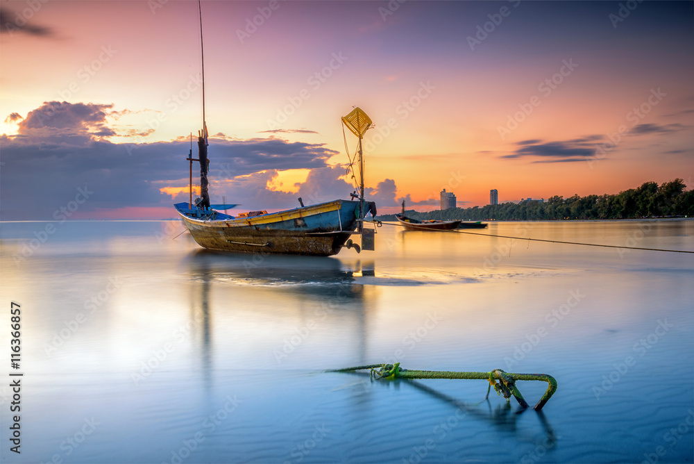 Thai fishing boat used as a vehicle for finding fish in the sea. Thai fishing boat used as a vehicle for finding fish in the sea.