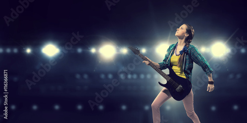 Female rock guitarist .  Mixed media © Sergey Nivens