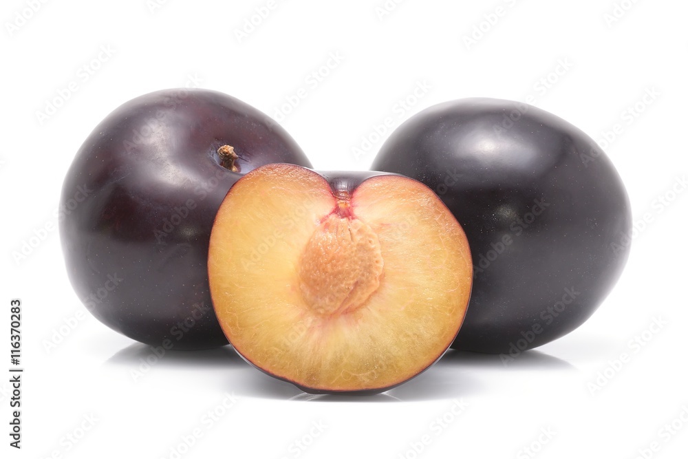 black plums isolated on white background