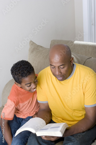 African American Family reading toghter photo