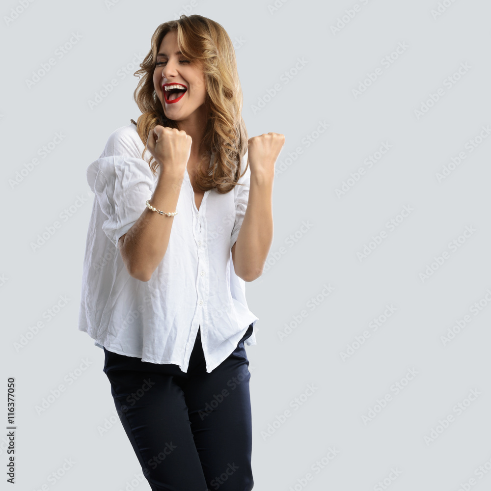 Successful business woman with arms up - isolated over a white b Successful business woman with arms up - isolated over a white b