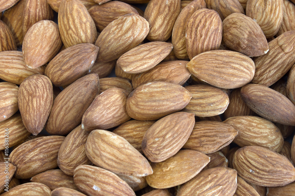 This is a photograph of a pile of Almonds This is a photograph of a pile of Almonds