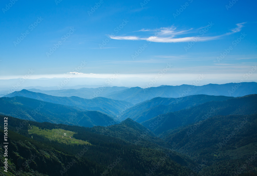 Mountain range on background of blue sky in twilight