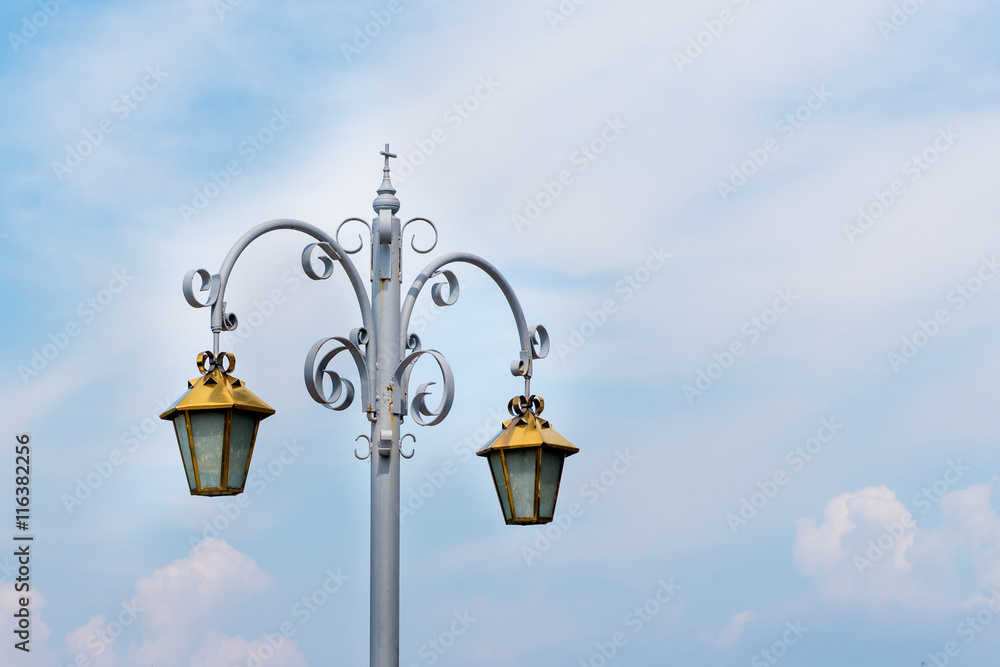 Beautiful street light against blue sky and beautiful clouds