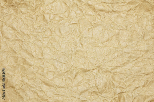 Recycled crumpled brown paper background with copy space for text or image.