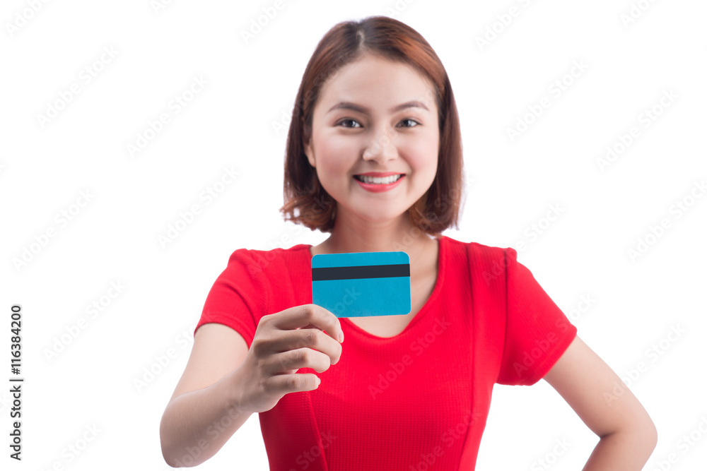 Beautiful friendly smiling asian girl showing credit card in han Beautiful friendly smiling asian girl showing credit card in han