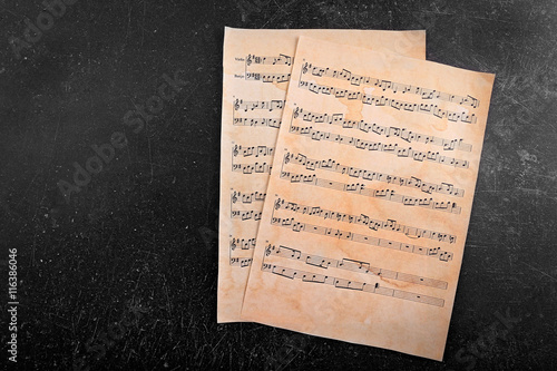 Music notes sheets on grey ...