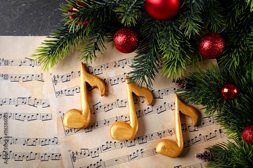 Christmas decorations on music sheets photo