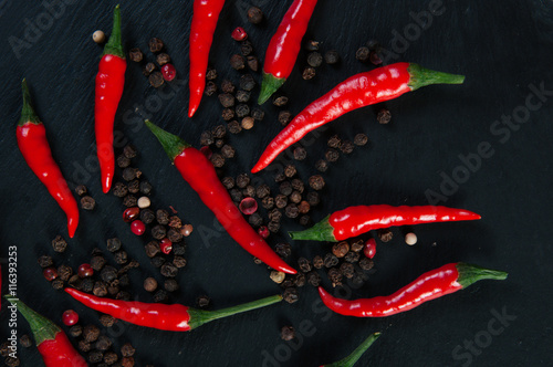 Red hot chili peppers on black slate background, Instagram filter