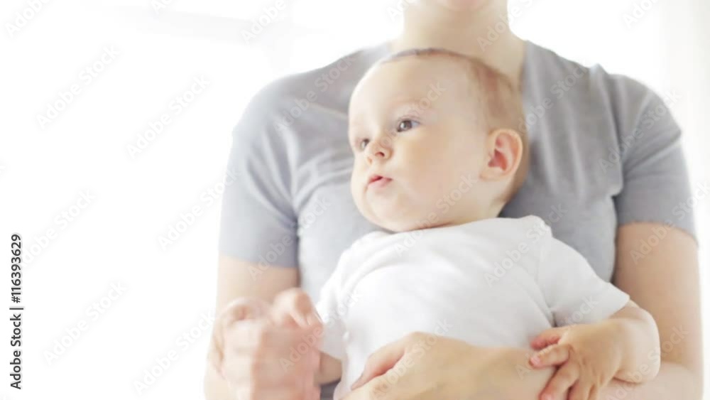 mother holding happy little baby at home 17 mother holding happy little baby at home 17