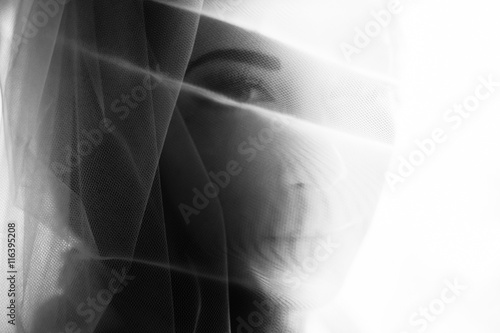 Fototapeta Perfect lady's face covered with a veil