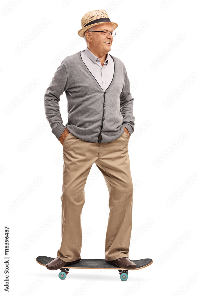 Senior man riding a skateboard Senior man riding a skateboard