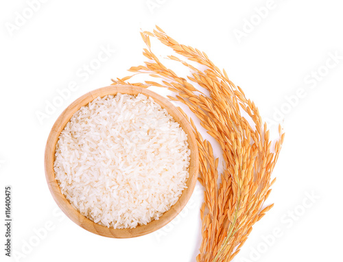 Top view, rice plants, grains of Thai jasmine rice in wood bowl