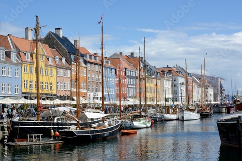 Nyhavn a 17th century harbour in Copenhagen with typical colorful houses and water canals, Nyhavn, Copenhagen, Denmark 