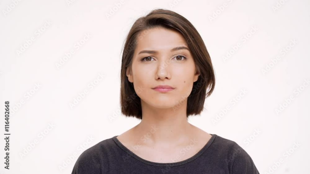 Portrait of young pretty girl playing mimicry. Slow motion. Portrait of young pretty girl playing mimicry. Slow motion.