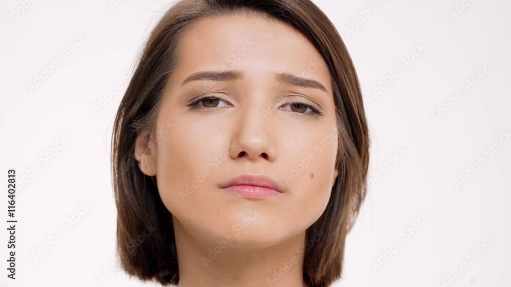 Portrait of young pretty girl sad. Slow motion. Portrait of young pretty girl sad. Slow motion.