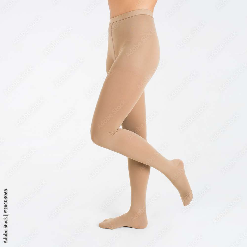 Female legs in tights on white background Female legs in tights on white background