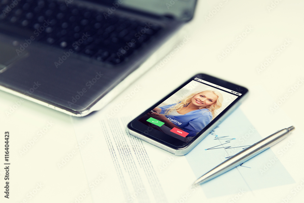 close up of smartphone incoming call on screen close up of smartphone incoming call on screen