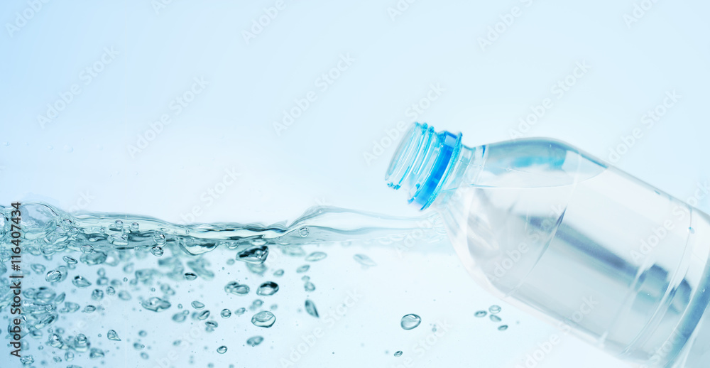 close up of plastic bottle with drinking water close up of plastic bottle with drinking water