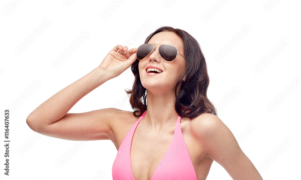 happy woman in sunglasses and bikini swimsuit