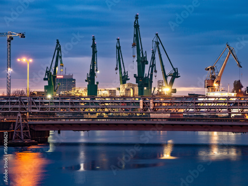 Industrial view of the Gdansk Shipyard at night, Poland.