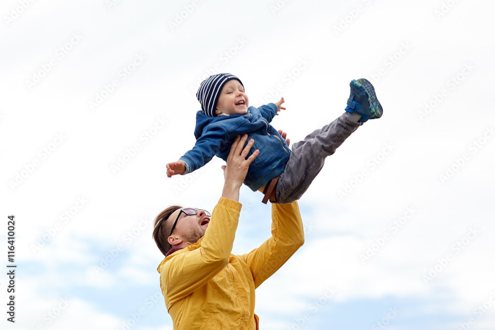 father with son playing and having fun outdoors father with son playing and having fun outdoors