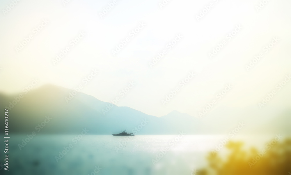 Defocused image, the lonely ship at the sea,  soft blurred