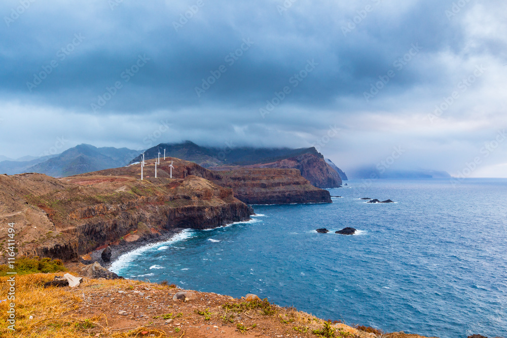 Fantastic view of the dark overcast sky. Dramatic and picturesque evening scene. Madeira, Portugal.
