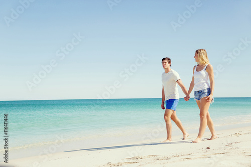 Romantic young couple on the beach