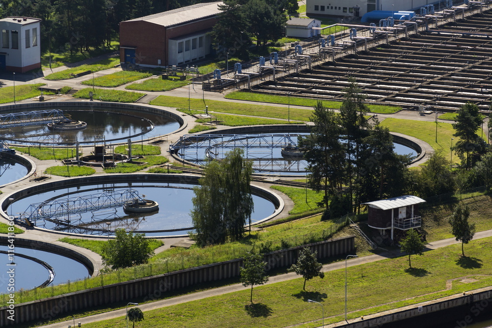 Aerial view of storage tanks in sewage water treatment plant Aerial view of storage tanks in sewage water treatment plant