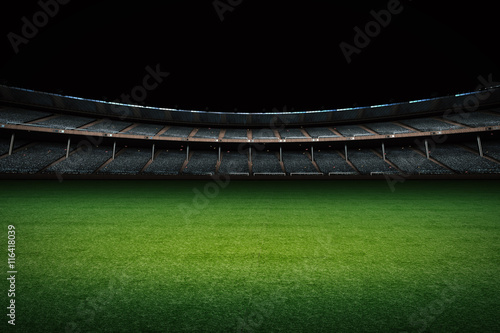 empty stadium with green field