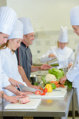 Chef talking to his students