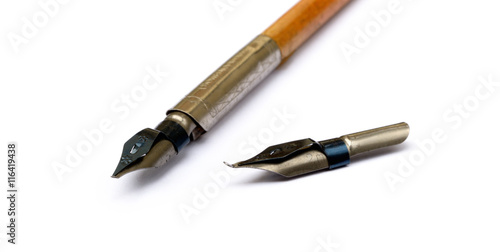 Old ink pen isolated on white background