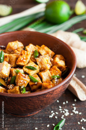 Fried tofu with sesame seeds and spices