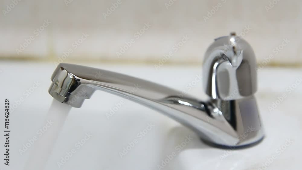 Open the water from faucet in the bathroom Open the water from faucet in the bathroom
