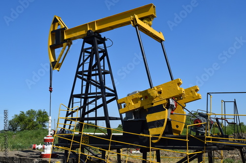 Wallpaper Mural Pumping unit as the oil pump installed on a well Torontodigital.ca