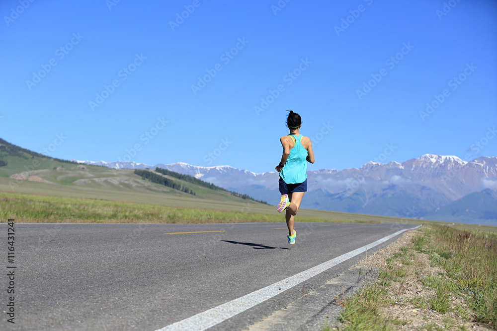 healthy lifestyle young woman runner running on trail healthy lifestyle young woman runner running on trail
