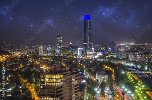 Night view of Santiago de Chile toward the east part of the city, showing the Mapocho river and Providencia and Las Condes districts photo