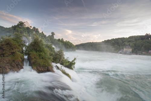 Rheinfall and the castle Laufen. The largest Europian waterfall during a summer sunset. Swizerland.