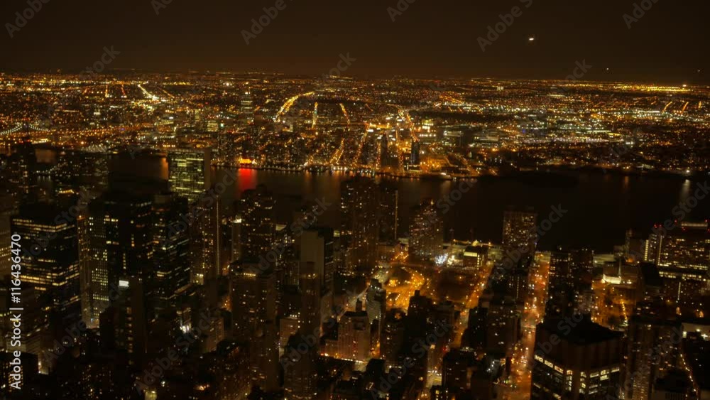 aerial view of big metropolis city at night. illuminated streets and buildings