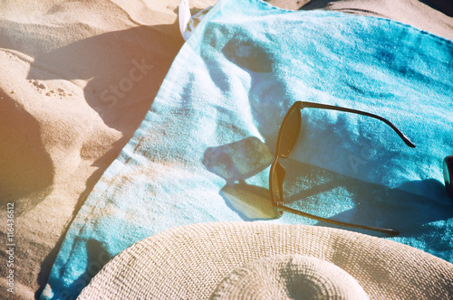 Billede på lærred Set sunbathers lying on a towel