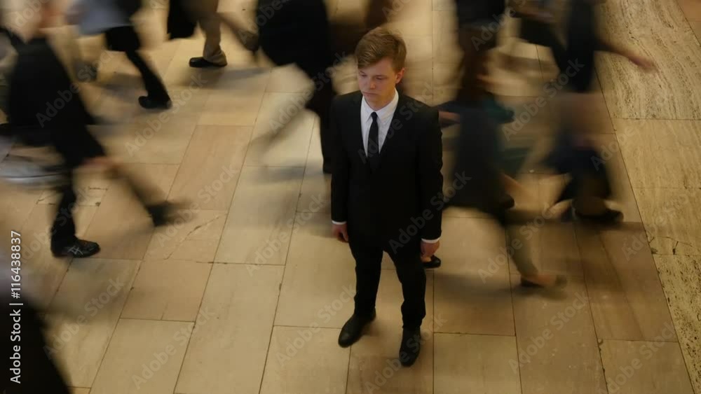 one man standing out of the crowd. young businessman career portrait one man standing out of the crowd. young businessman career portrait