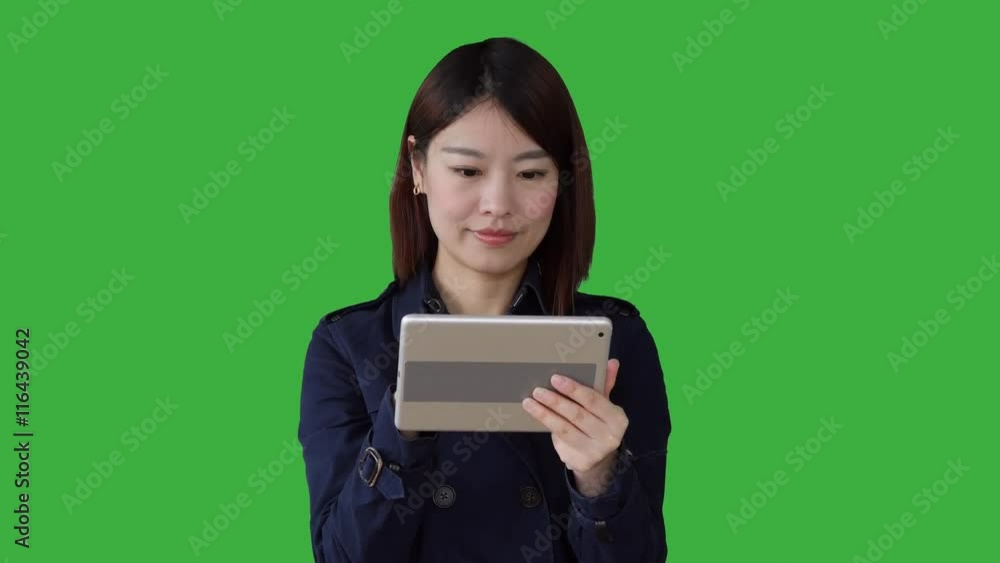 portrait of young asian women standing isolated against green screen background portrait of young asian women standing isolated against green screen background