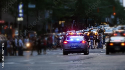 Wallpaper Mural NYPD police cars chasing trough the streets of new york city. flashing alarm Torontodigital.ca