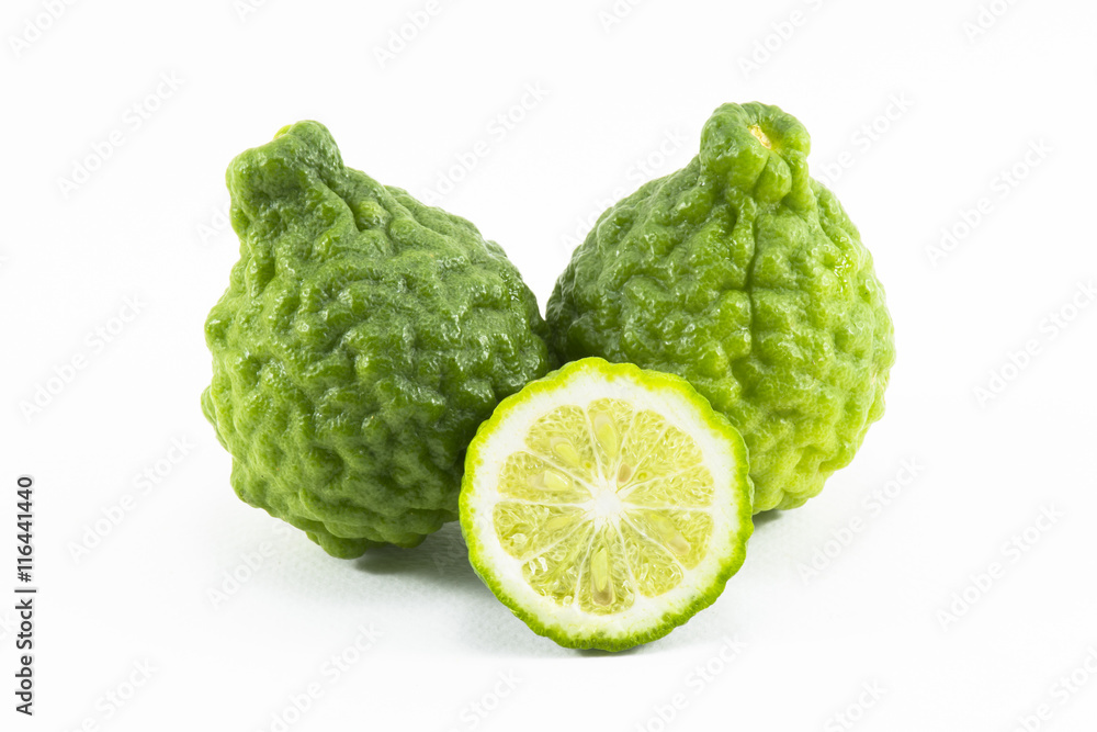Kaffir lime and kaffir lime slice isolated is fruits and leaves are used as a spice for thai food and etc Kaffir lime and kaffir lime slice isolated is fruits and leaves are used as a spice for thai food and etc
