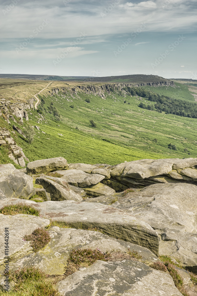 Magnificent landscape of rock formations and moorland at Stanage Edge in the Peak District in Derbyshire, a stunning area of great natural beauty covering 555 square miles across central England
