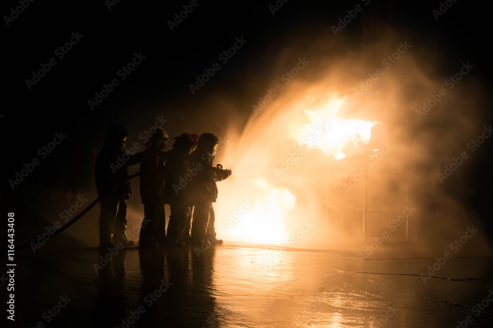 Firefighter Fireman Attack Fire with High Pressure Water Firefighter Fireman Attack Fire with High Pressure Water